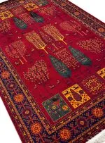 فرش بلوچ طرح درختی 2 700 شانه رنگ قرمز لاکی کد 70051 - فرشخونه