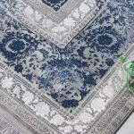 فرش وینتیج طرح افشان گل آبی با رنگ بندی جدید