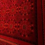 فرش گبه بلوچ طرح پیوسته زمینه لاکی 700 شانه کد 9006 - فرشخونه