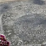 فرش کهنه نما ترنج گرد طوسی با رنگ بندی جدید
