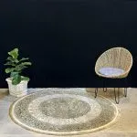 فرش دایره ای وینتیج طرح آذینگل نسکافه ای با گل سبز 700 شانه کد 771050 - فرشخونه