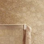 فرش وینتیج طرح هندریک رنگ نسکافه ای با گل طلایی 700 شانه 2550 کد 771055 - فرشخونه